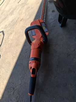 24 in. 3.3 Amp Corded Dual Action Electric Hedge Hog Trimmer with Rotating Handle