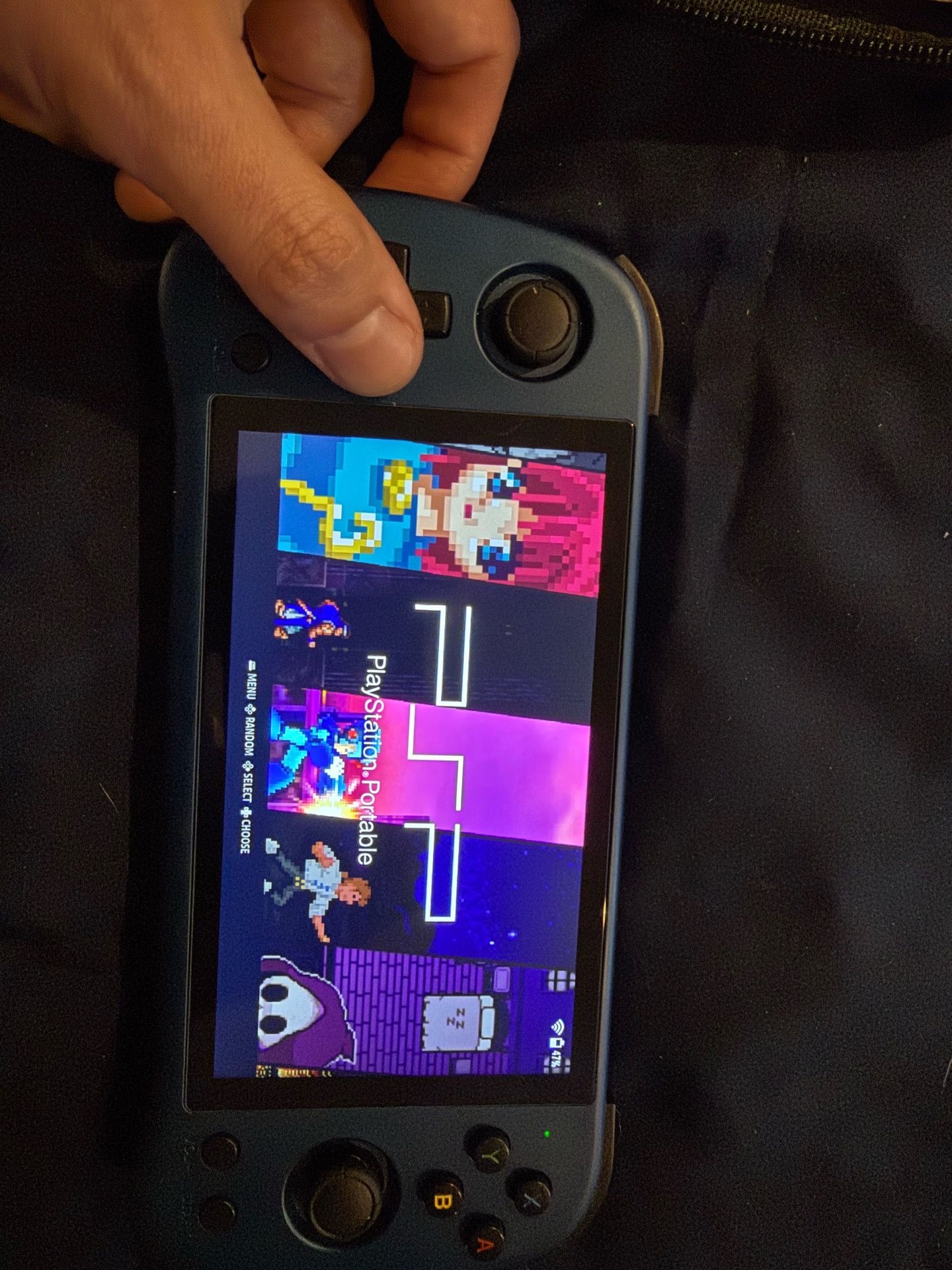 Powkiddy X55 retro game emulator.