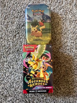 Escended Heroes Bundle box and Pikachu Tin