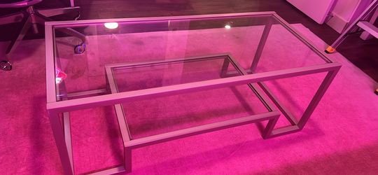 Glass and metal coffee table