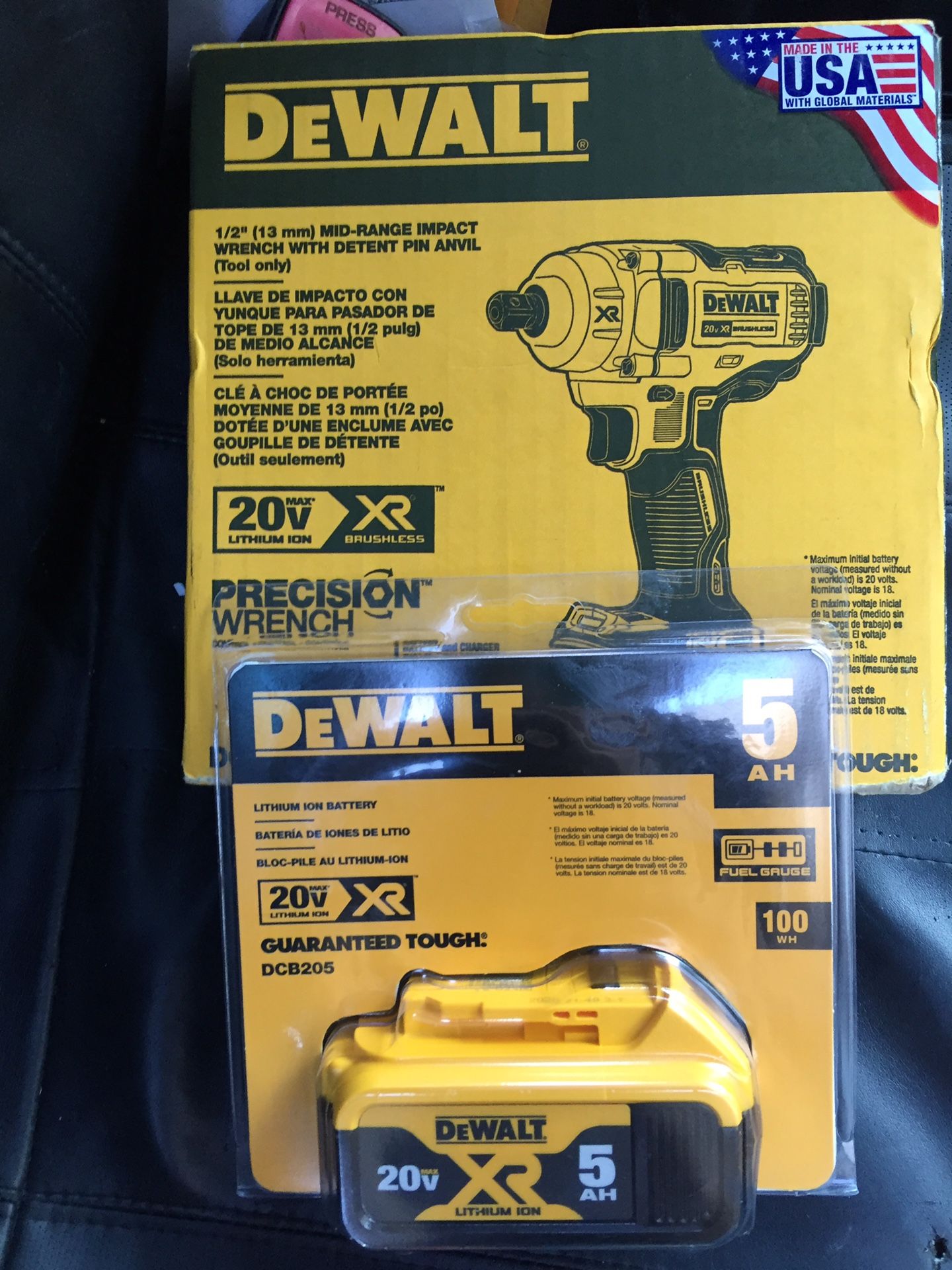 Dewalt half inch mid-range impact wrench and 5 ah battery.