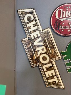 Chevrolet camo metal sign