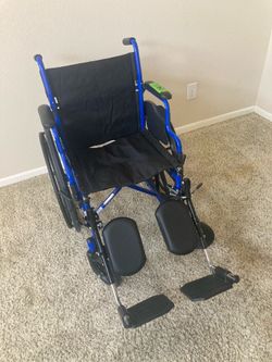 Wheelchair New with 18” Seat and Elevating Footrests
