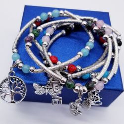 Set of 6 Bracelets with Charms.