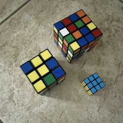 Pristine Condition! Bundle Of (3) Rubik’s Cubes: Small, Medium & Large (L = Original)