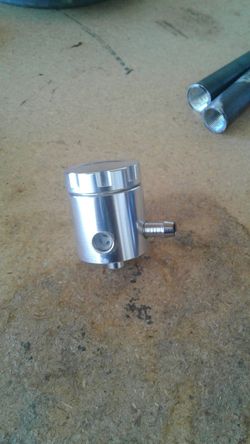 Universal brake fluid reservoir