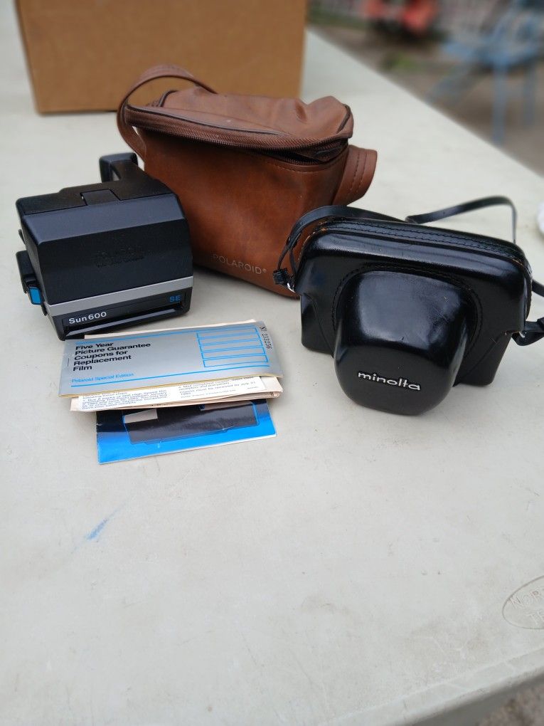 1 Polaroid Sun600se The Other 1 Minolta Hi Matic 7s....OBO.