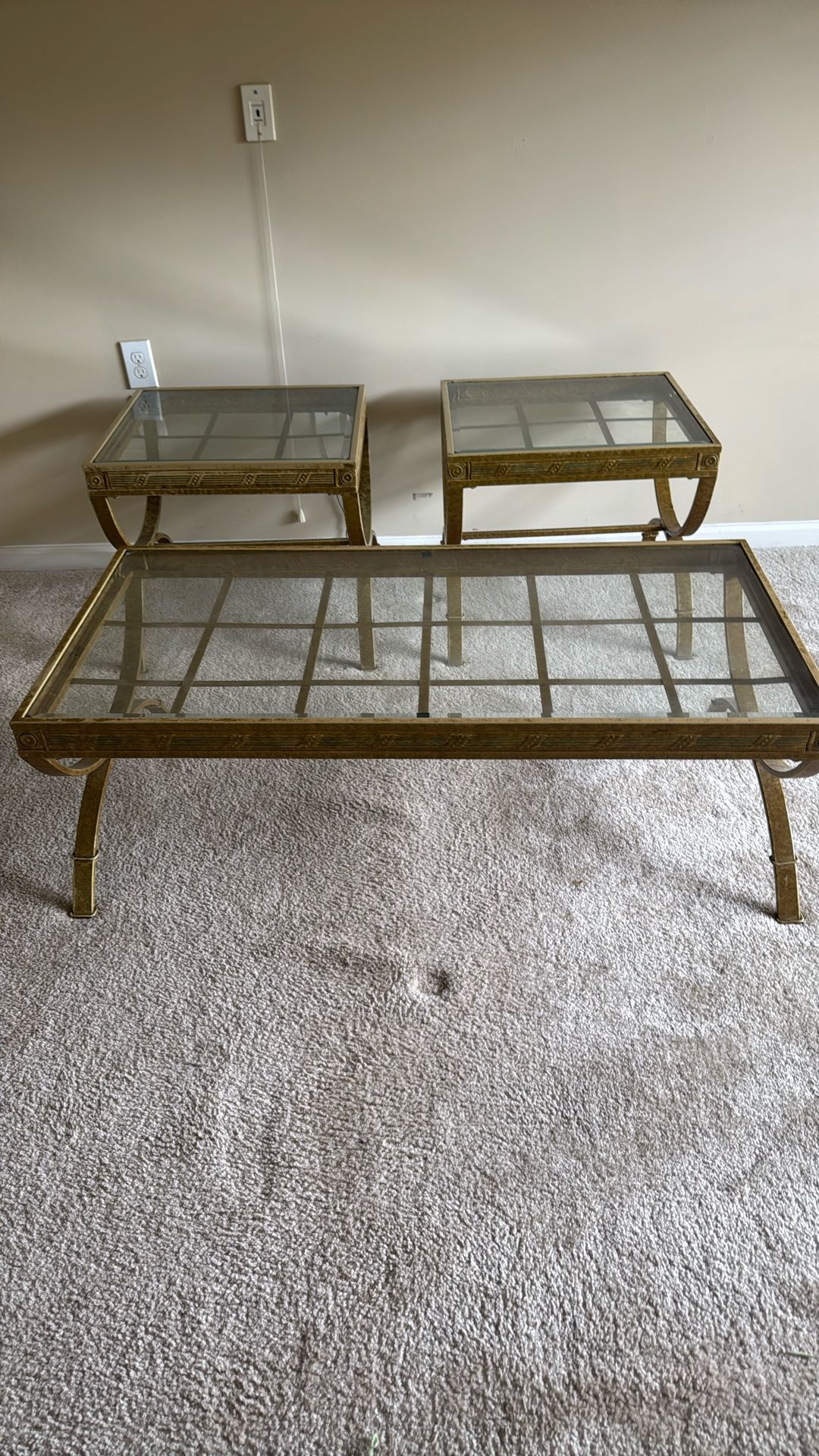 Three glass and metal tables