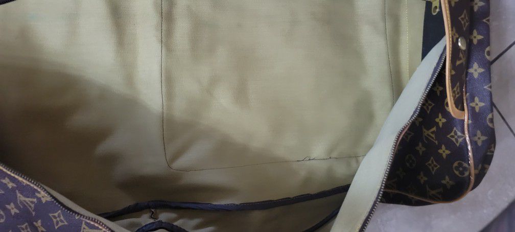 Friend of mine is selling a 1960's LV garment bag! Message me for
