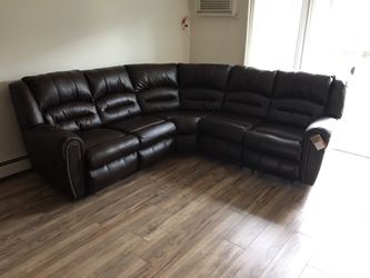 Brand new ASHLEY BRAND reclining sectional sofa