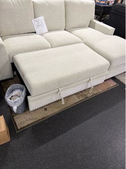 2 Piece Sectional with pull out bed & Storage Chaise on Sale