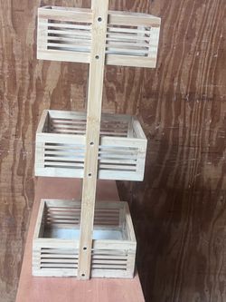 This is a 3-tier bamboo storage organizer. location below  31705 Wesley Chapel blvd Fl 33543 Storage Mart