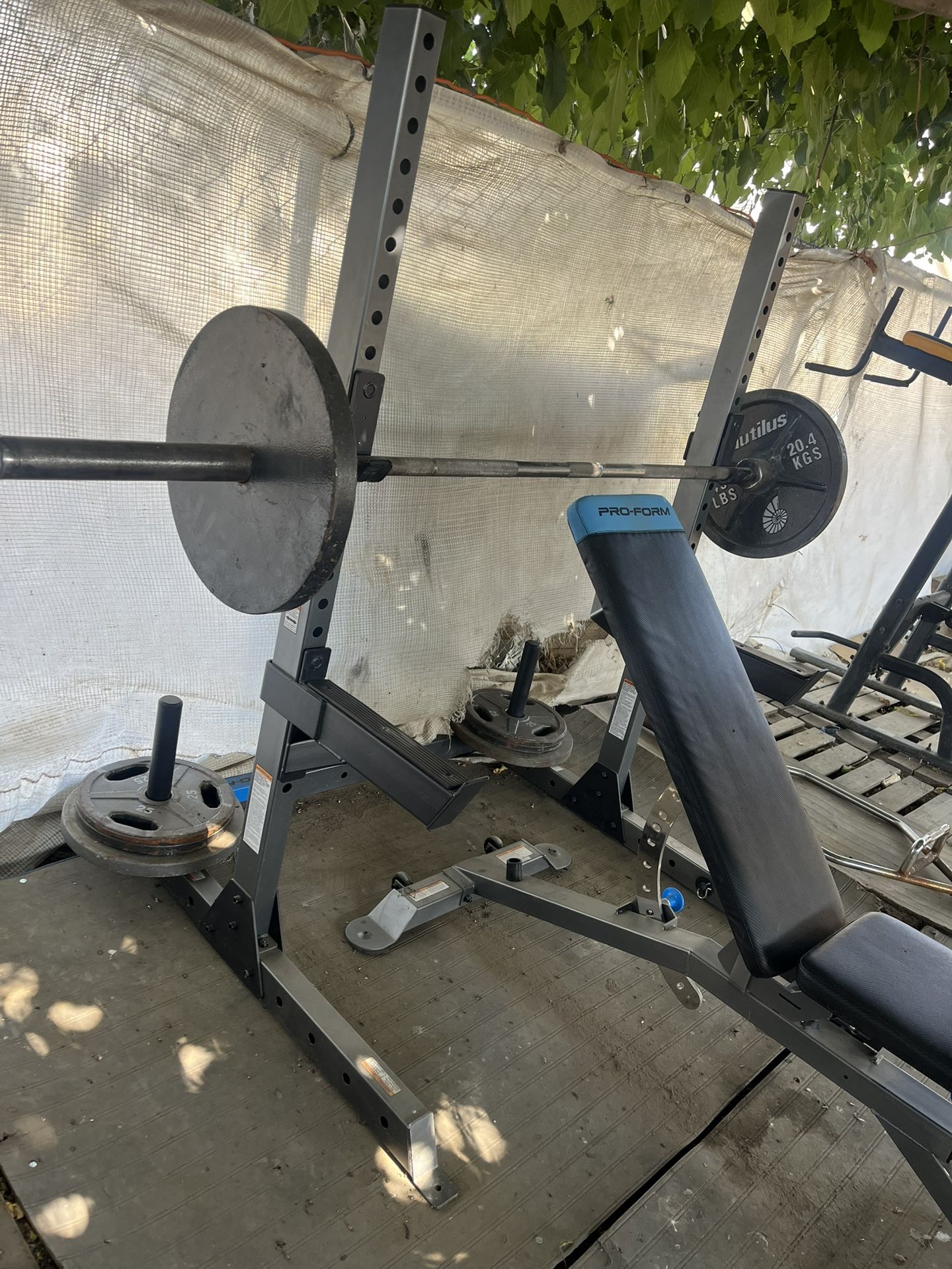 Weight Bench And Weights Pull Up Tower