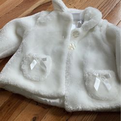 New white fur Cost for 9 month old 