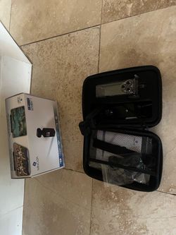Minolta MN4KP1 Action Camera with Case and Accessories