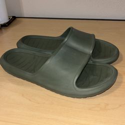 GREEN SLIP ON SLIDES. SIZE 12