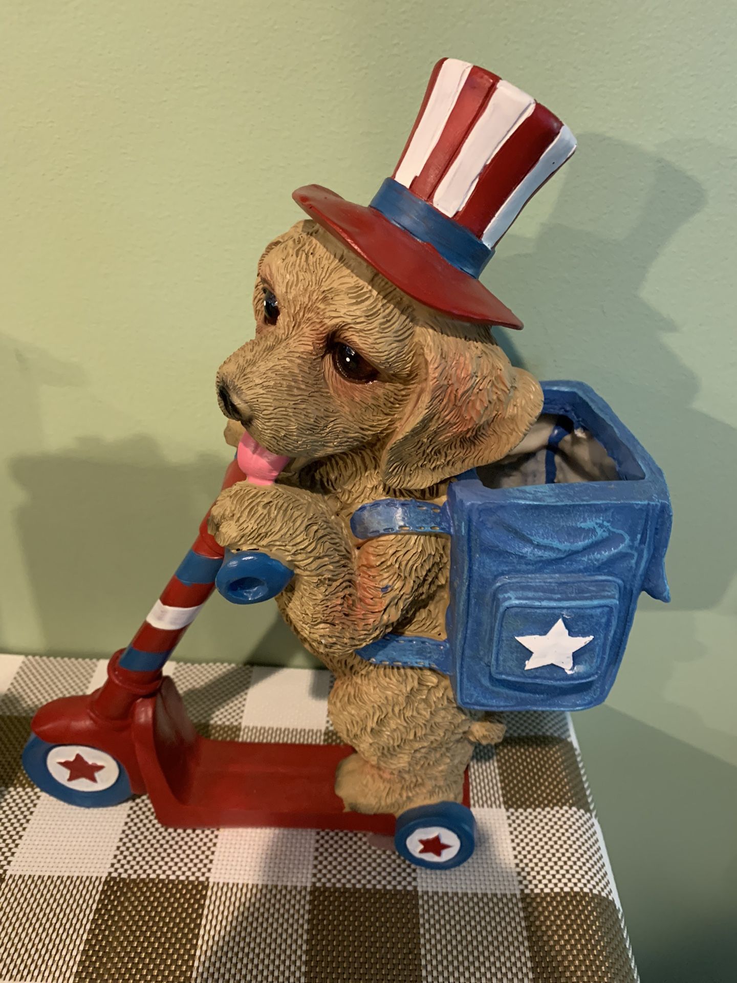 12 Inches Tall Dog On Scooter Decoration In Patriotic Colors. Dog Has Backpack That Can Hold A Small Succulent Or Plant.