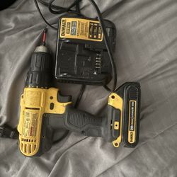 Dewalt drill with charger base and battery