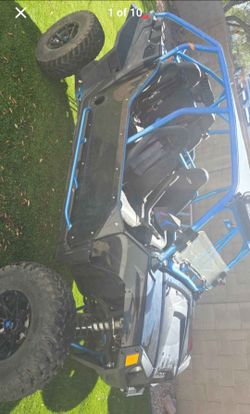 2013 Side-by-Side UTV with Custom Blue Roll Cage