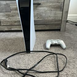 Sony PlayStation 5 Console Digital Edition and DualSense controller.
