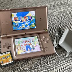 Nintendo DS with Mario Party game, complete with stylus & charger. $55