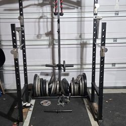 Weight Rack And Weights And Bars
