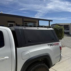 Overland vehicle systems bed cap