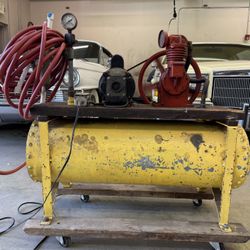 Awesome Antique air compressor tank, pump on wheels. Works great!