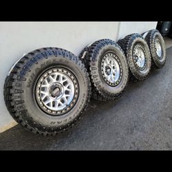 17" KMC rims w/ 35" Goodyear Duratrac Wrangler Tires