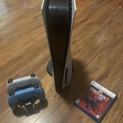 Ps5 Disc Version With Spider Man 2, 2 Controllers (White And Blue), Dual Controller Charger, and a Ps5 Stand
