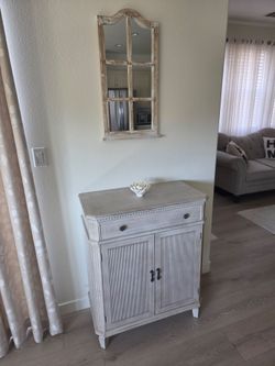 Washed wooden chest and matching decorative mirror