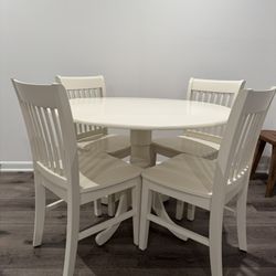 White Table With Four Chairs