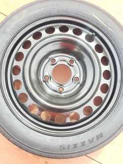 t125/80d16 maxxis spare tire.