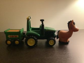 John Deere toy tractor and horse