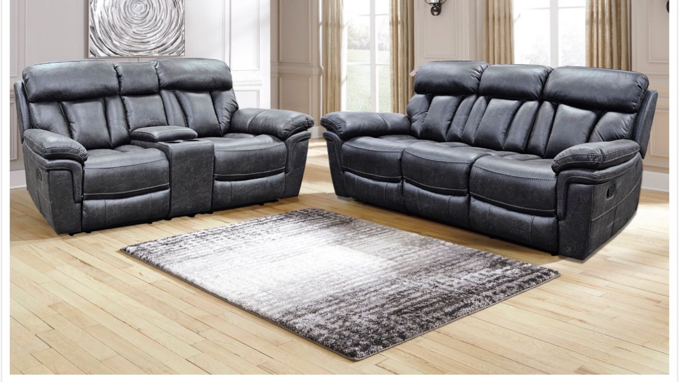 New Graphite Reclinable Sofa And Loveseat 