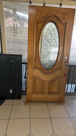 Wooden Entry Door with Oval Glass Insert