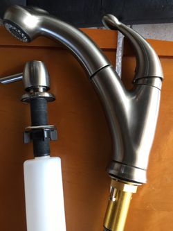 Delta faucet with soap dispenser