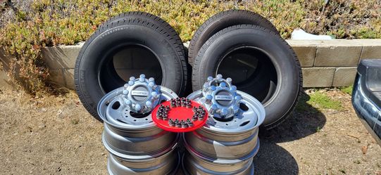 Set of four Michellin LT 245/75R17 with Ford factory steel wheels
