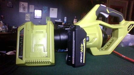 Blower by Ryobi  40 v  used for 15 minutes only!