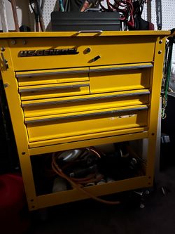 Tool box on wheels including tools