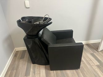 Shampoo bowl with attached chair