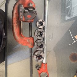 Ridgid pipe threader 3/8”, 1/2”, and 2- 3/4” dies and #3 pipe cutter 