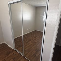 Sliding mirror closet doors