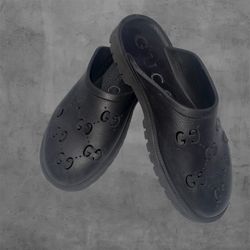 Black Gucci Rubber Mules With Signature "GG" Detail