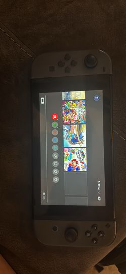 Nintendo Switch (Black) With 5 Games Included 