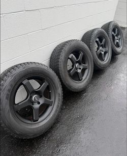 4 Bridgestone Blizzak DM-V1 255/65R17 Tires on 17” Rims