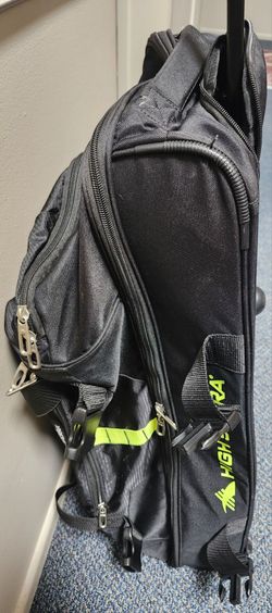 High Sierra wheeled backpack, side compression strips