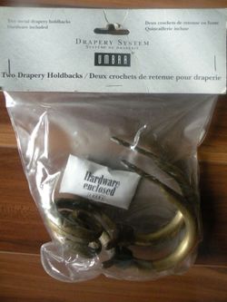 Brand new Curtain hold backs