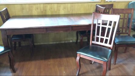 Solid wood table with leaf & 6 chairs