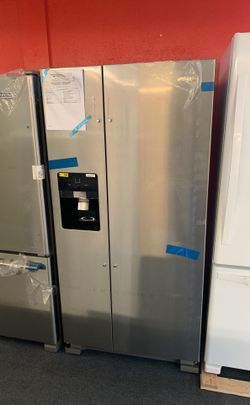 New scratch and dent Whirlpool 22ft.³ Stainless steel side-by-side refrigerator one year warranty